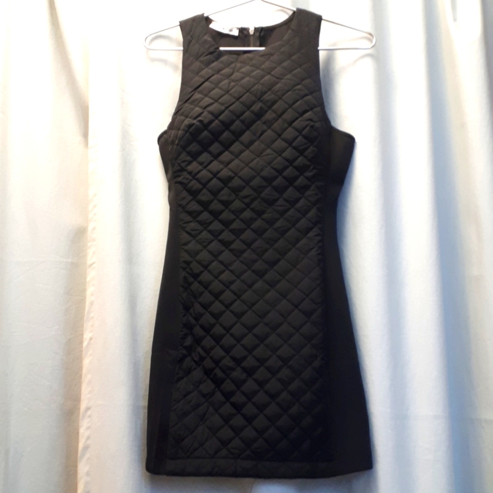 Black Mini Dress,Petite size 10,Form fitting.